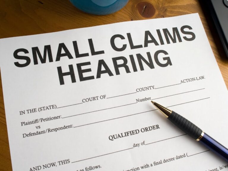 Small Claims Hearing form with pen on desk – Las Vegas civil claim preparation services