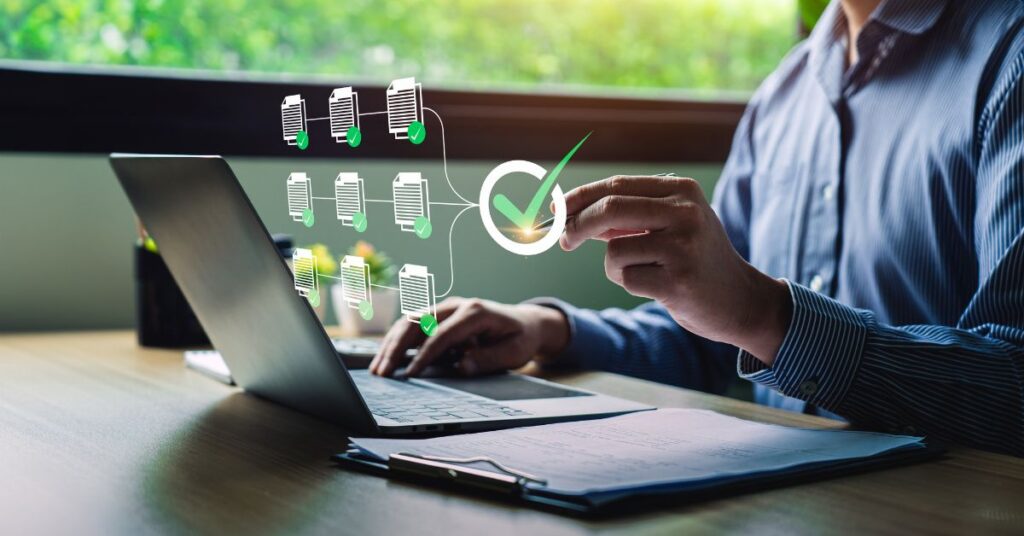 Professional completing digital document processing with verification icons, representing I-9 employment verification services at Fingerscan Digital Inc.