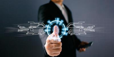 Mobile Fingerprinting with digital thumb scan and biometric technology in a professional setting.