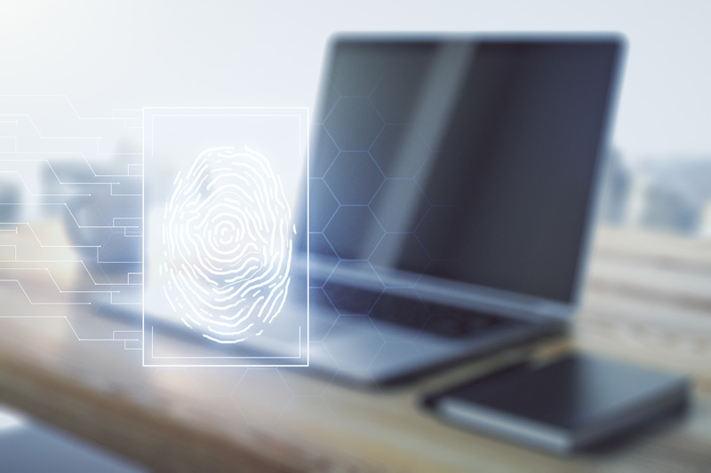 Digital fingerprint graphic displayed next to a laptop, symbolizing online FBI fingerprinting services by Fingerscan Digital in San Jose and Las Vegas.