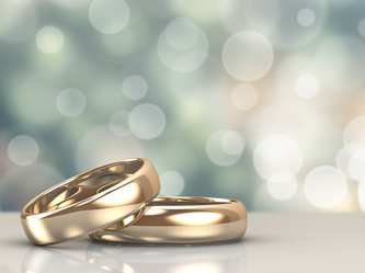 Two gold wedding rings symbolizing marriage certificate apostille services