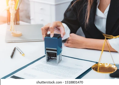 Female notary stamp an agreement
