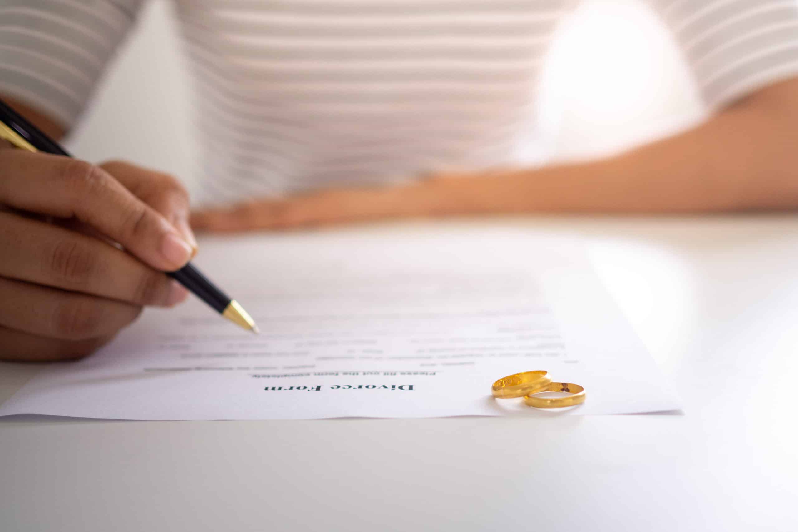 Woman reviewing divorce decree for apostille services in San Jose CA